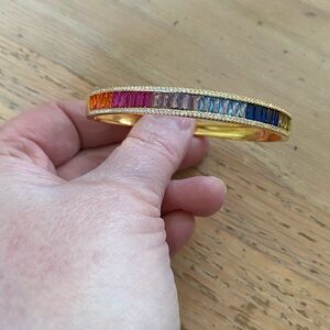 Rainbow colored gem bracelet in gold for small wrist.  Costume piece.